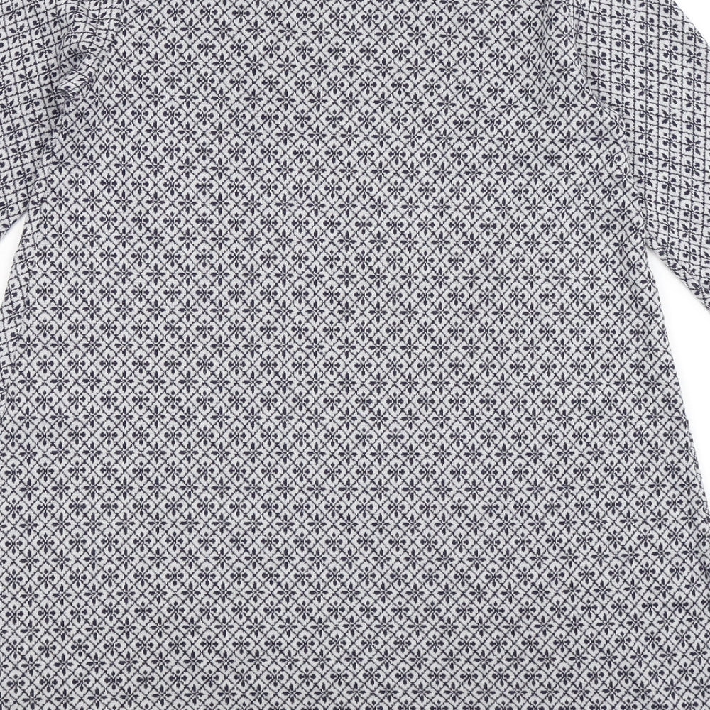 Brand and care label for Zuiki women’s blue geometric jumper, size S