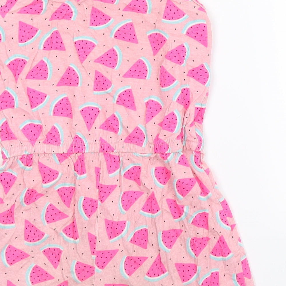 Brand and care label for Primark girls’ pink playsuit one-piece, size 4-5, years