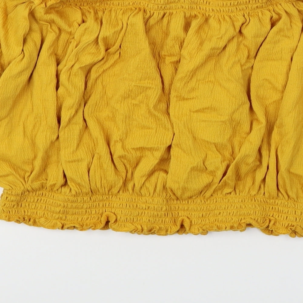 Brand and care label for Divided women’s yellow cropped t-shirt, size L