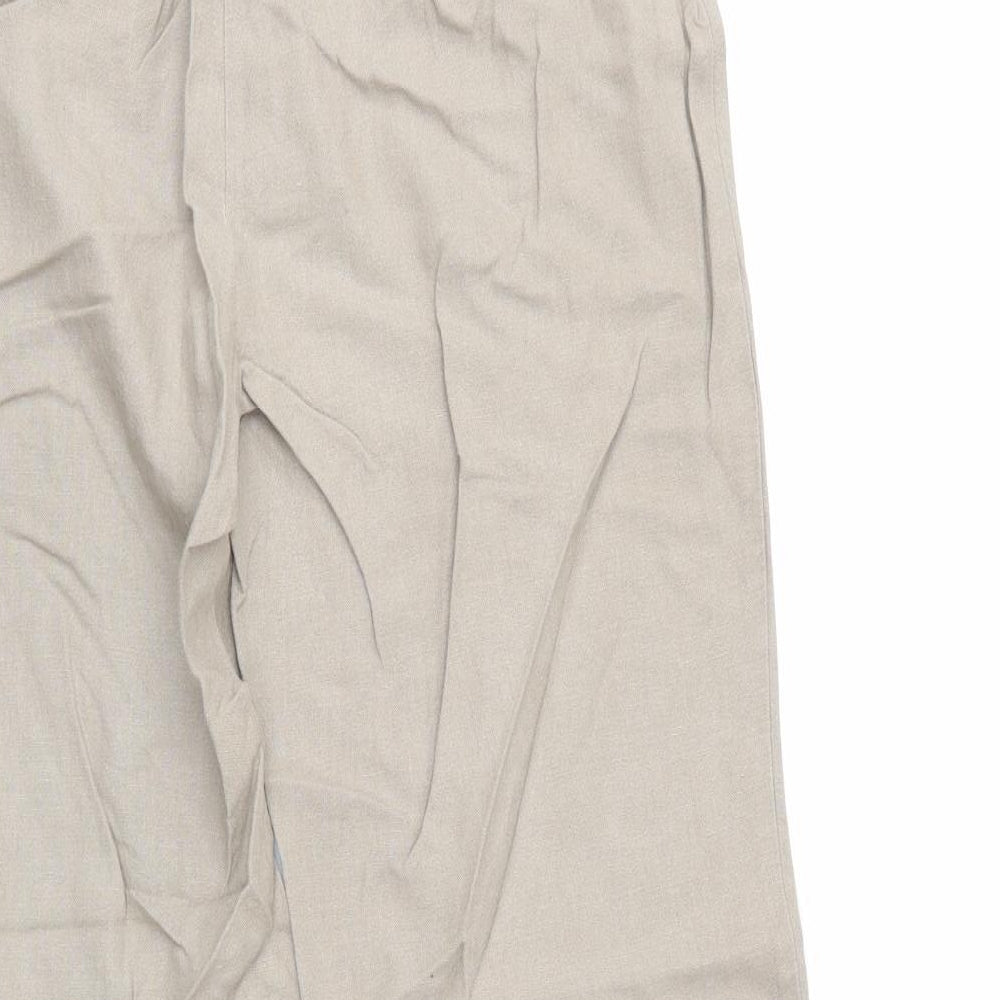 Brand and care label for Marks & Spencer Woman women’s beige trousers, size UK 12, 26.5-inch leg