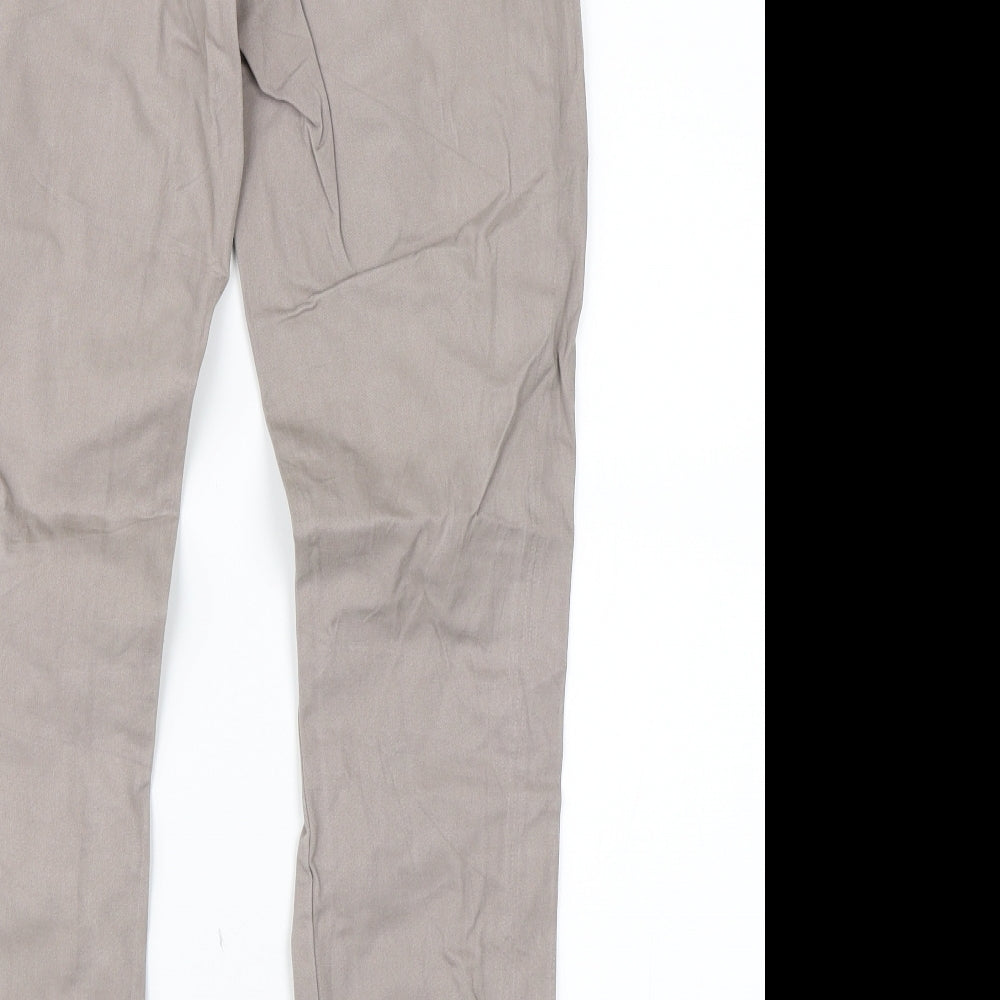 Brand and care label for Up fashion women’s beige trousers, size UK 10, 31-inch leg