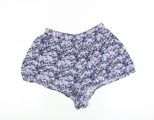 Additional front view of Divided by H&M women’s blue floral hot pants shorts, size UK 10