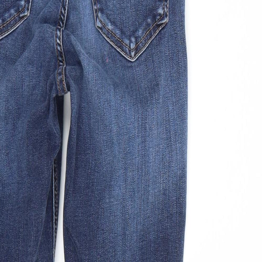 Brand and care label for Topshop women’s blue skinny jeans, size UK 25, 27-inch leg