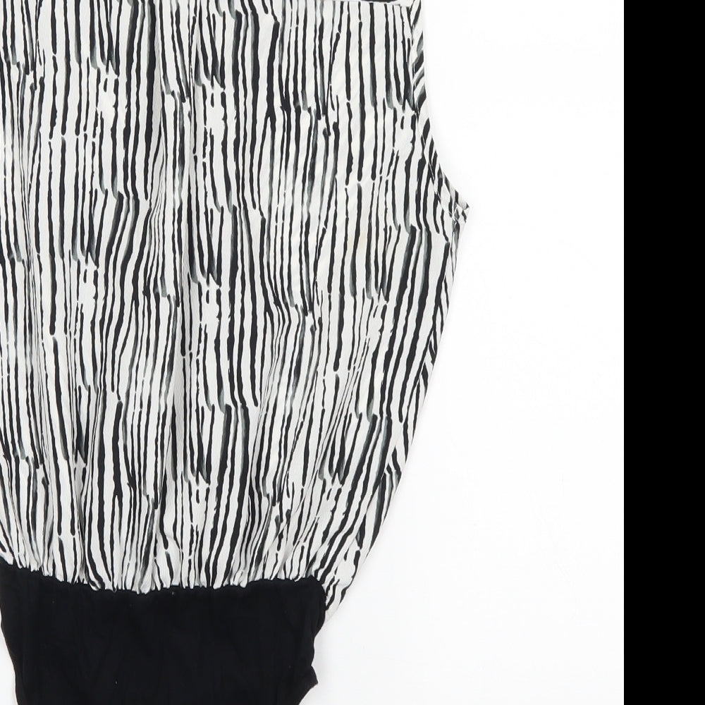 Brand and care label for Topshop women’s black animal print leotard one-piece, size UK 8
