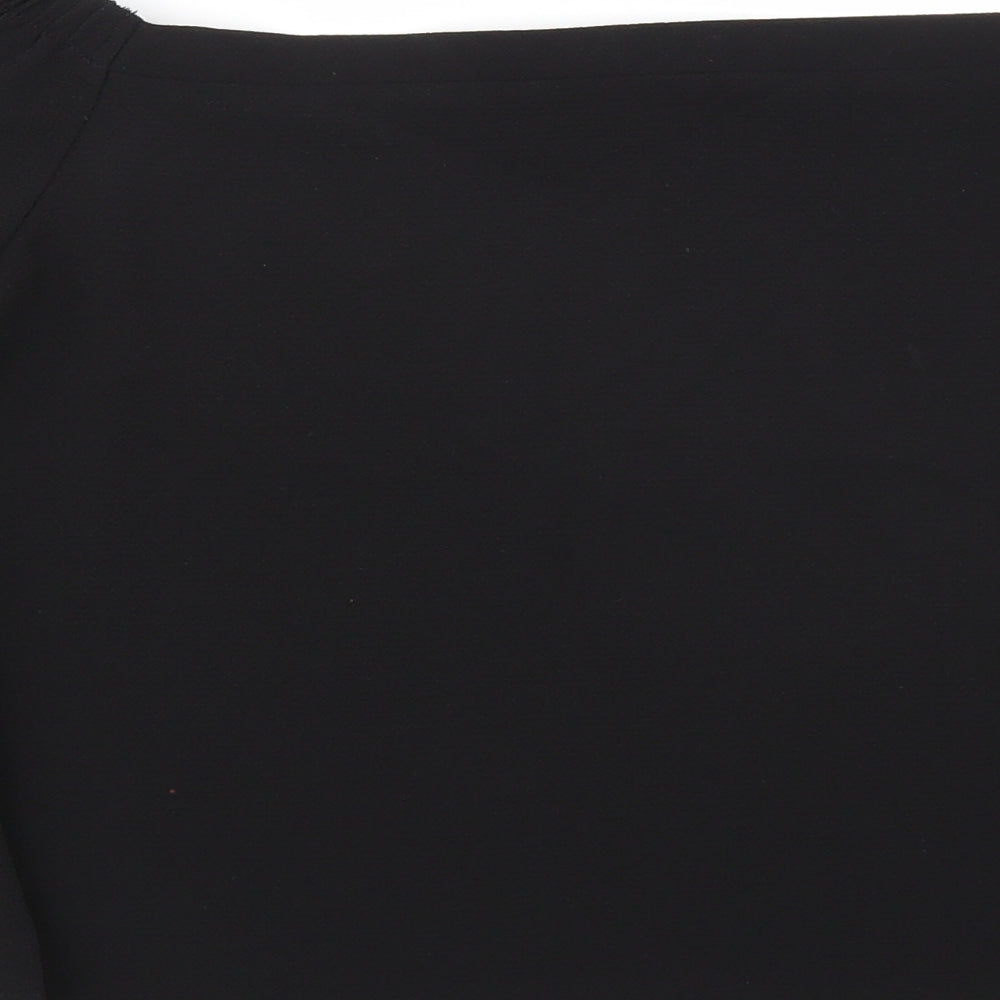 Brand and care label for New Look women’s black basic blouse, size UK 6