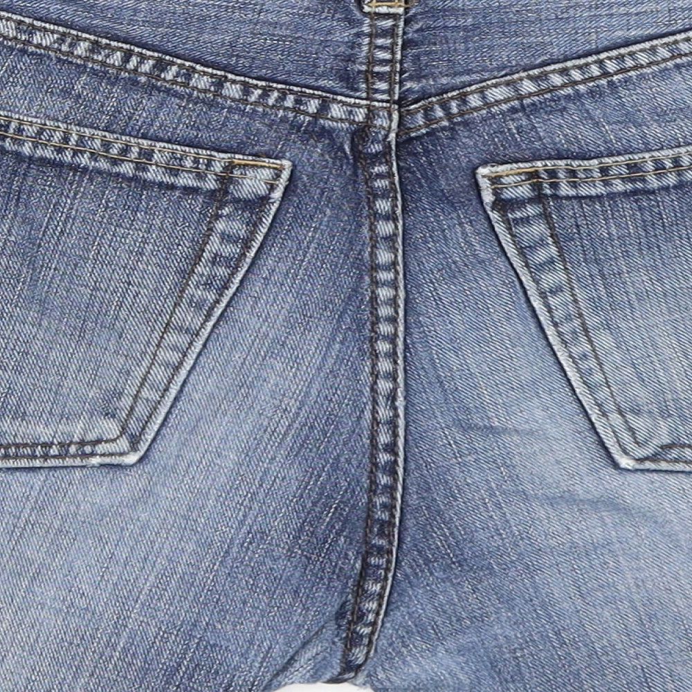 Brand and care label for Gap women’s blue denim cut-off shorts, size UK 30, in