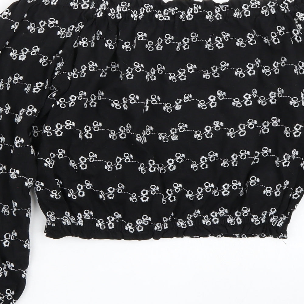 Brand and care label for New Look girls’ black rayon cropped t-shirt, size 12, years