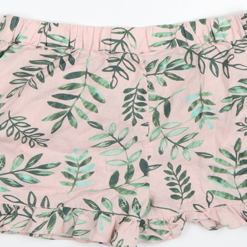 Brand and care label for George girls’ pink floral hot pants shorts, size 6-7, years