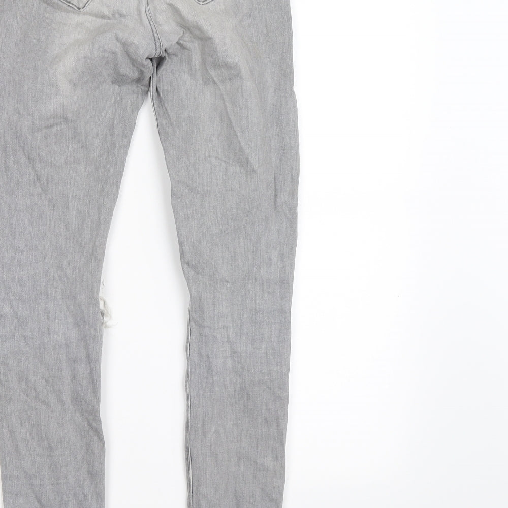Brand and care label for River Island women’s grey denim skinny jeans, size UK 8, 26-inch leg