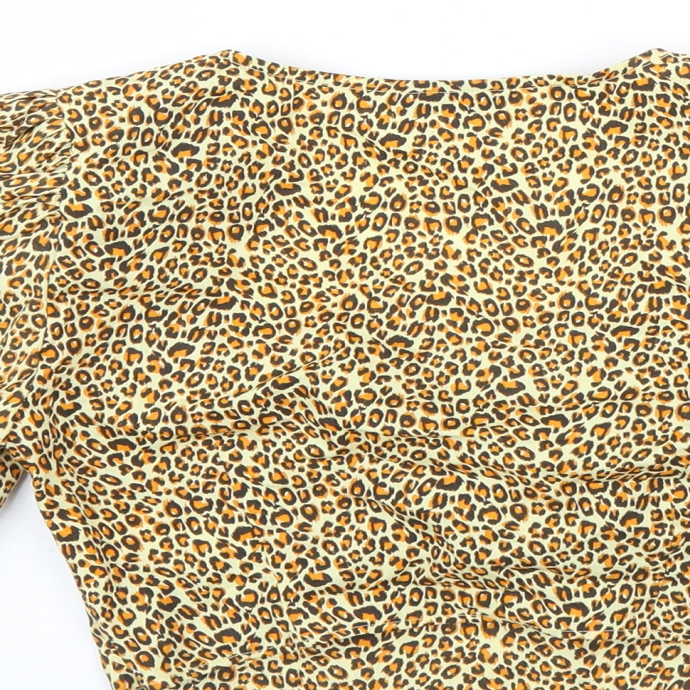 Brand and care label for Topshop women’s brown animal print basic blouse, size UK 8