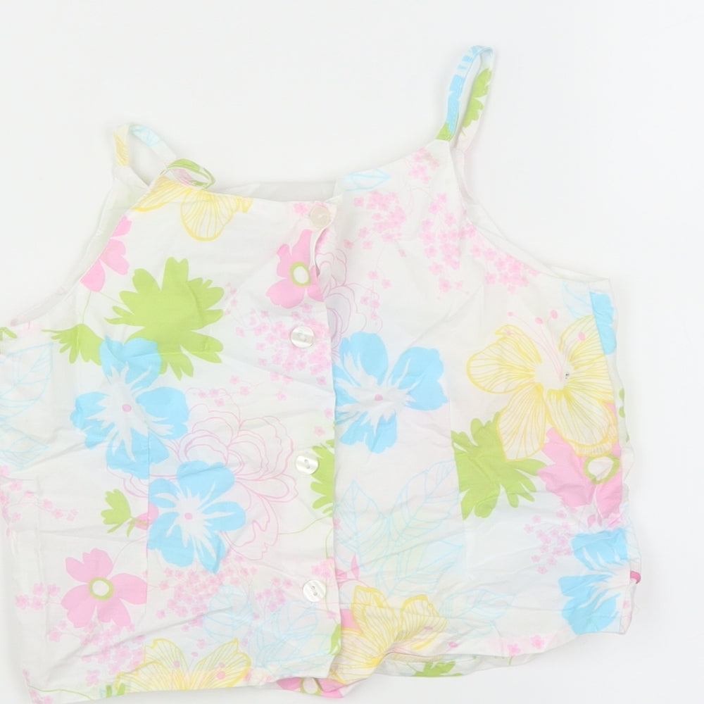 Brand and care label for Next girls’ white floral camisole t-shirt, size 9, years