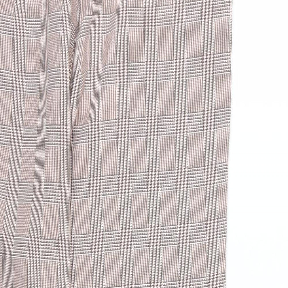 Brand and care label for Retro & Icone women’s red striped rayon trousers, size L, 26-inch leg