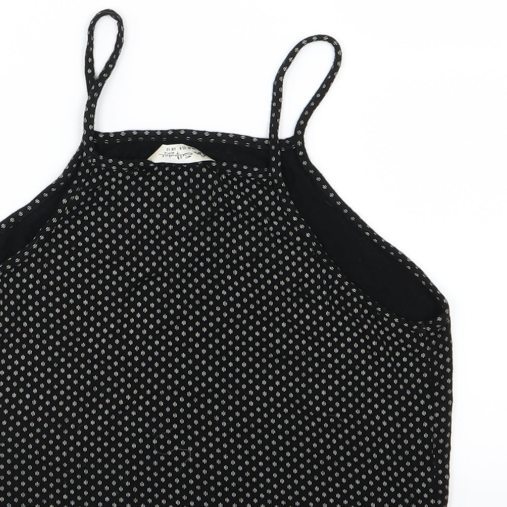Brand and care label for Miss Selfridge women’s black polka dot jersey cropped tank, size UK 12