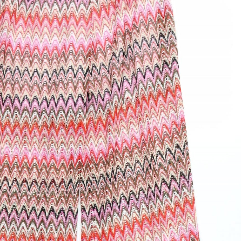 Brand and care label for Julie women’s multicoloured striped knit trousers, size S, 31-inch leg