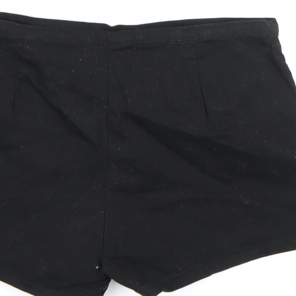 Brand and care label for Forever 21 women’s black denim hot pants shorts, size M
