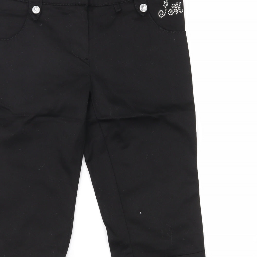 Brand and care label for Julien Macdonald girls’ black cropped jeans, size 9, years