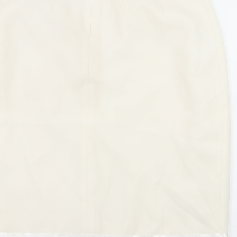 Brand and care label for AMARANTO women’s white a-line skirt, size UK 32, in