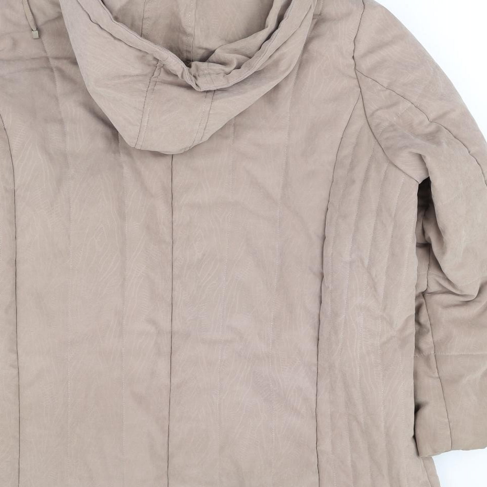 Brand and care label for pre worn women’s beige jacket, size UK 14