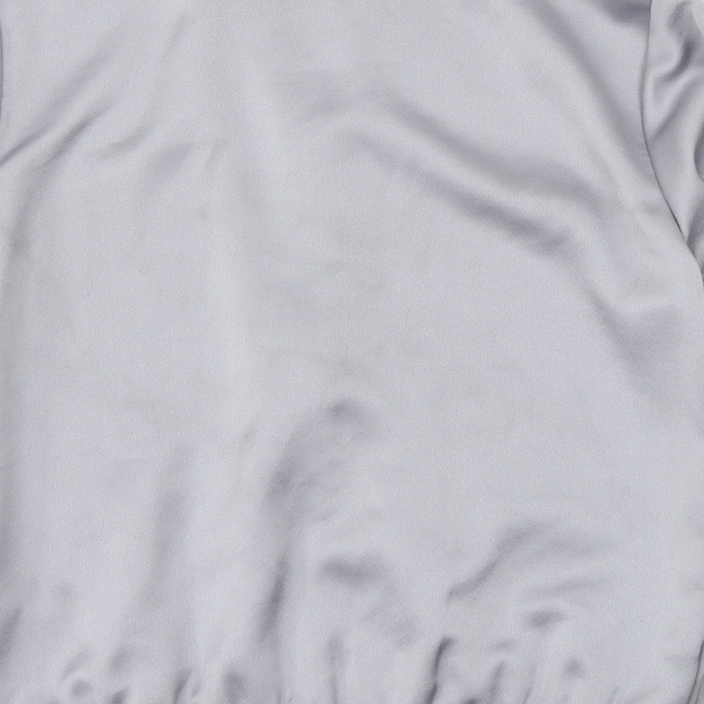 Brand and care label for Topshop women’s grey jacket, size UK 8