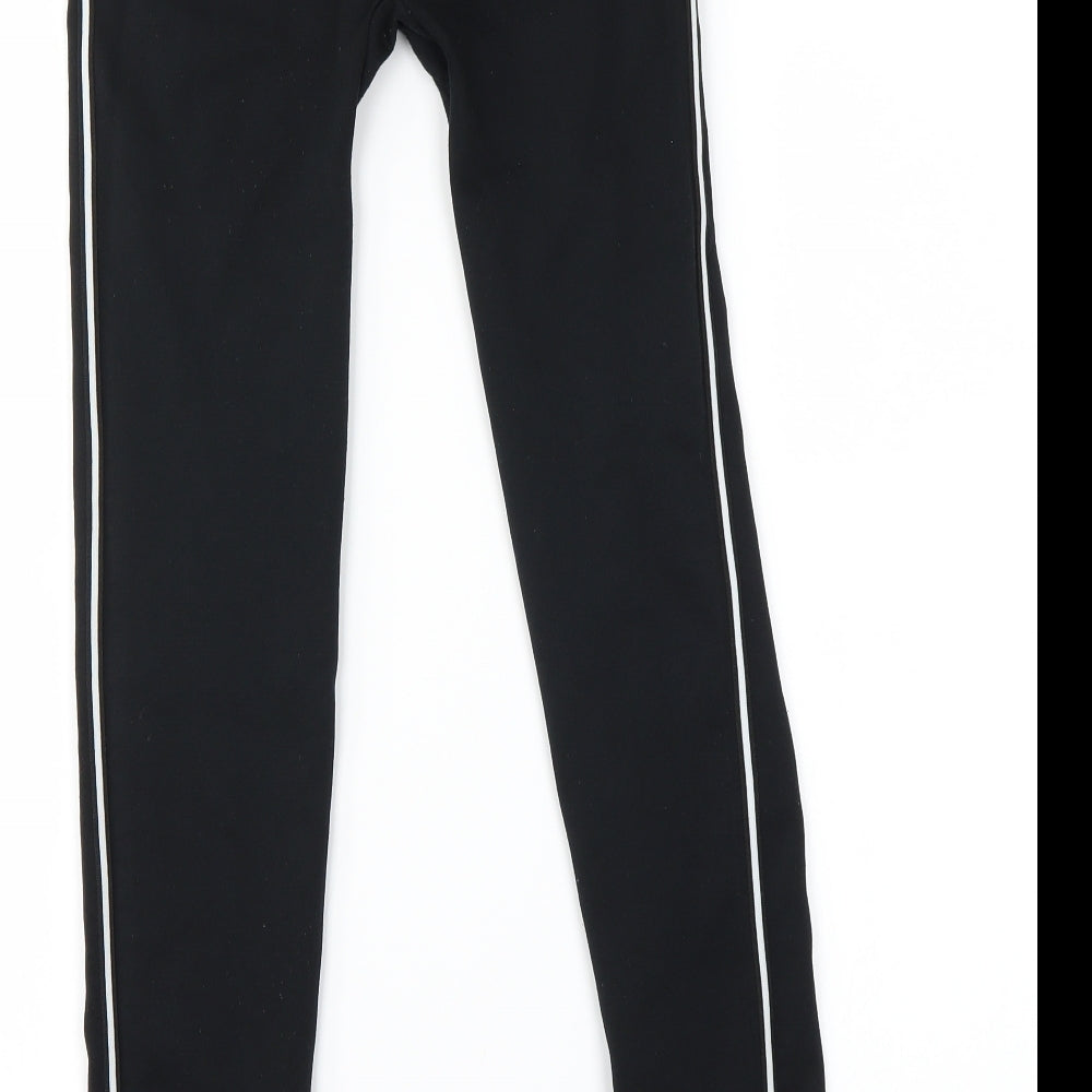 Brand and care label for QED London girls’ black sweatpants, size M