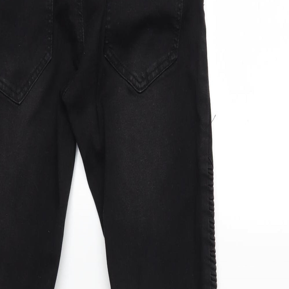 Brand and care label for Boohoo men’s black denim skinny jeans, size 30, in, 31-inch leg