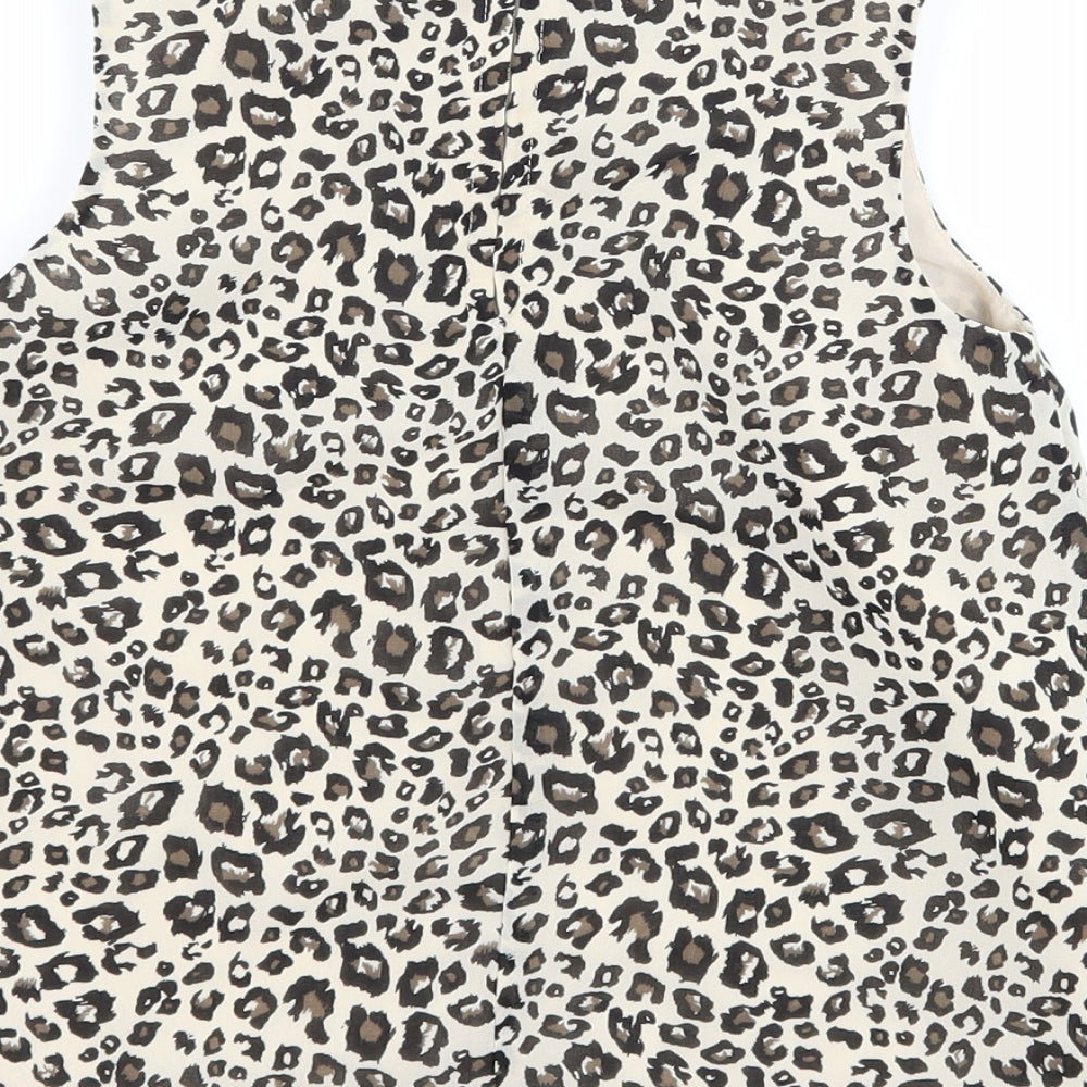 Brand and care label for George girls’ green animal print basic tank, size 5-6, years