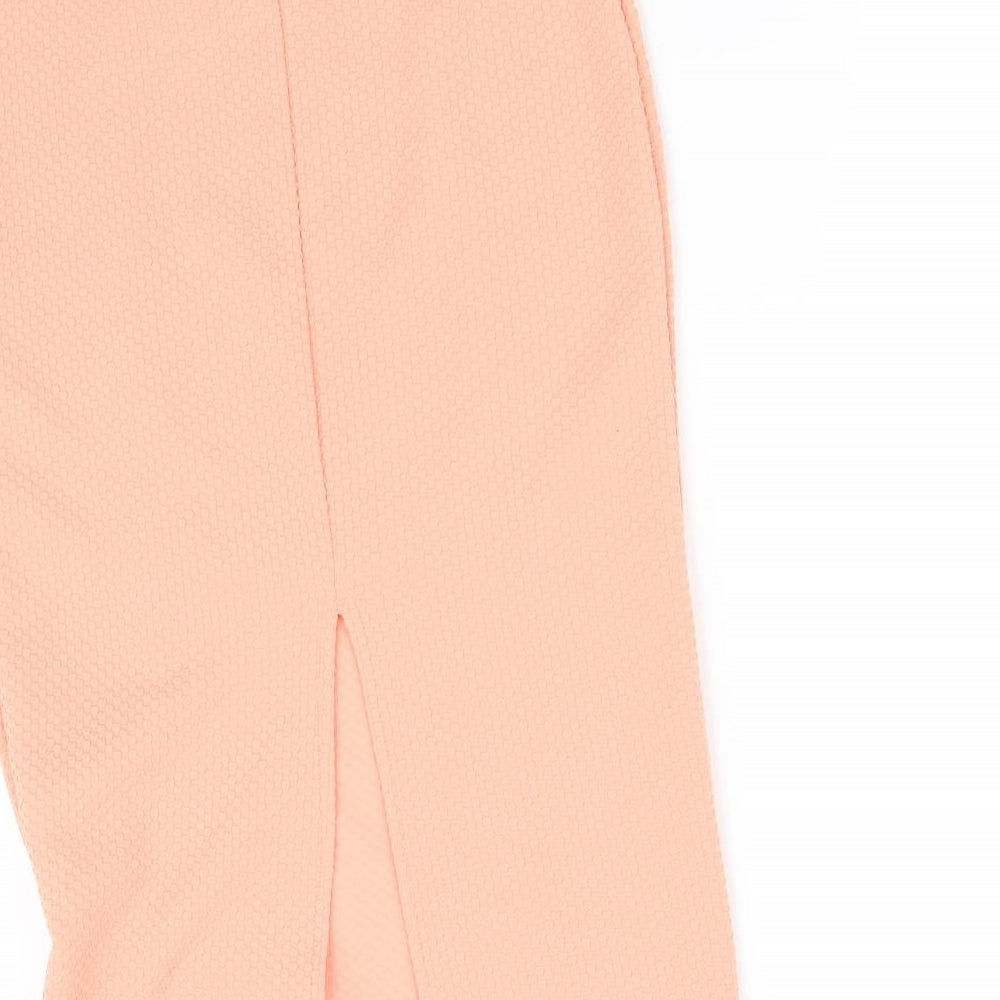 Brand and care label for miss slefidge women’s orange flare skirt, size UK 8