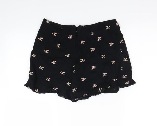 Back view of Miss Selfridge women’s black floral skimmer shorts, size UK 10