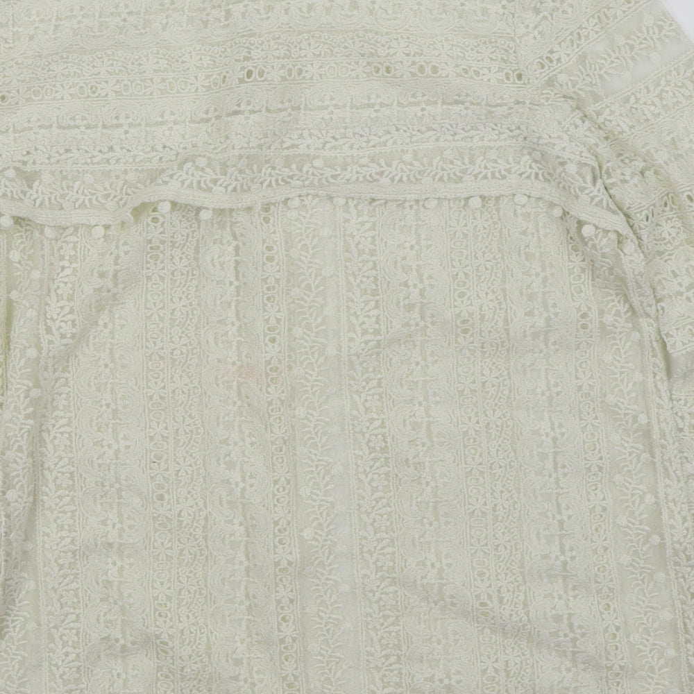 Brand and care label for Mango casual women’s white basic t-shirt, size XS