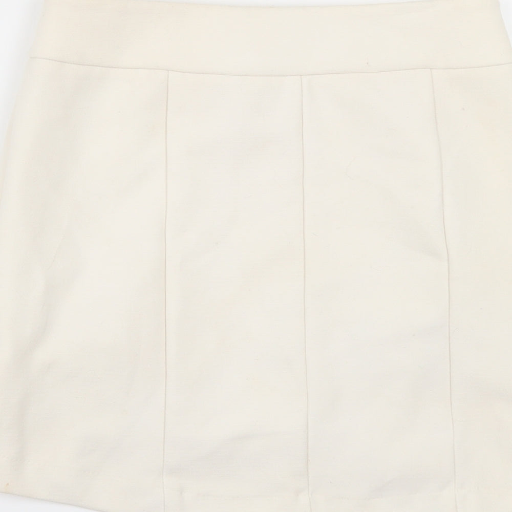 Brand and care label for Preworn women’s ivory mini skirt, size UK 30, in