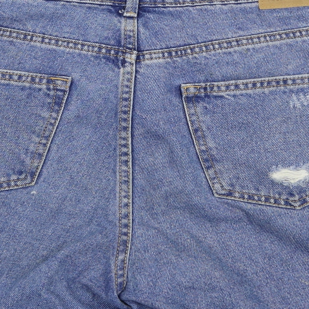 Brand and care label for Denim Pimkie women’s blue cut-off shorts, size S