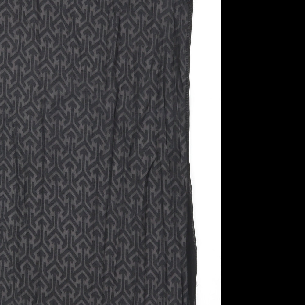Brand and care label for Marks & Spencer women’s black geometric basic tank, size UK 12, - black and white