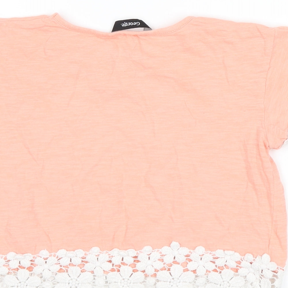 Brand and care label for George girls’ pink cropped t-shirt, size 4-5, years