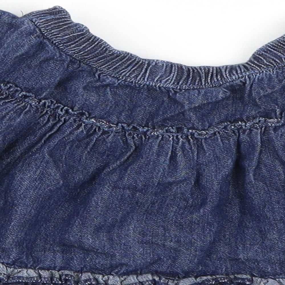 Brand and care label for George girls’ blue denim skater skirt, size 2-3, years