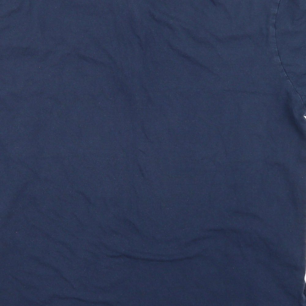 Brand and care label for Studio men’s blue polo, size L