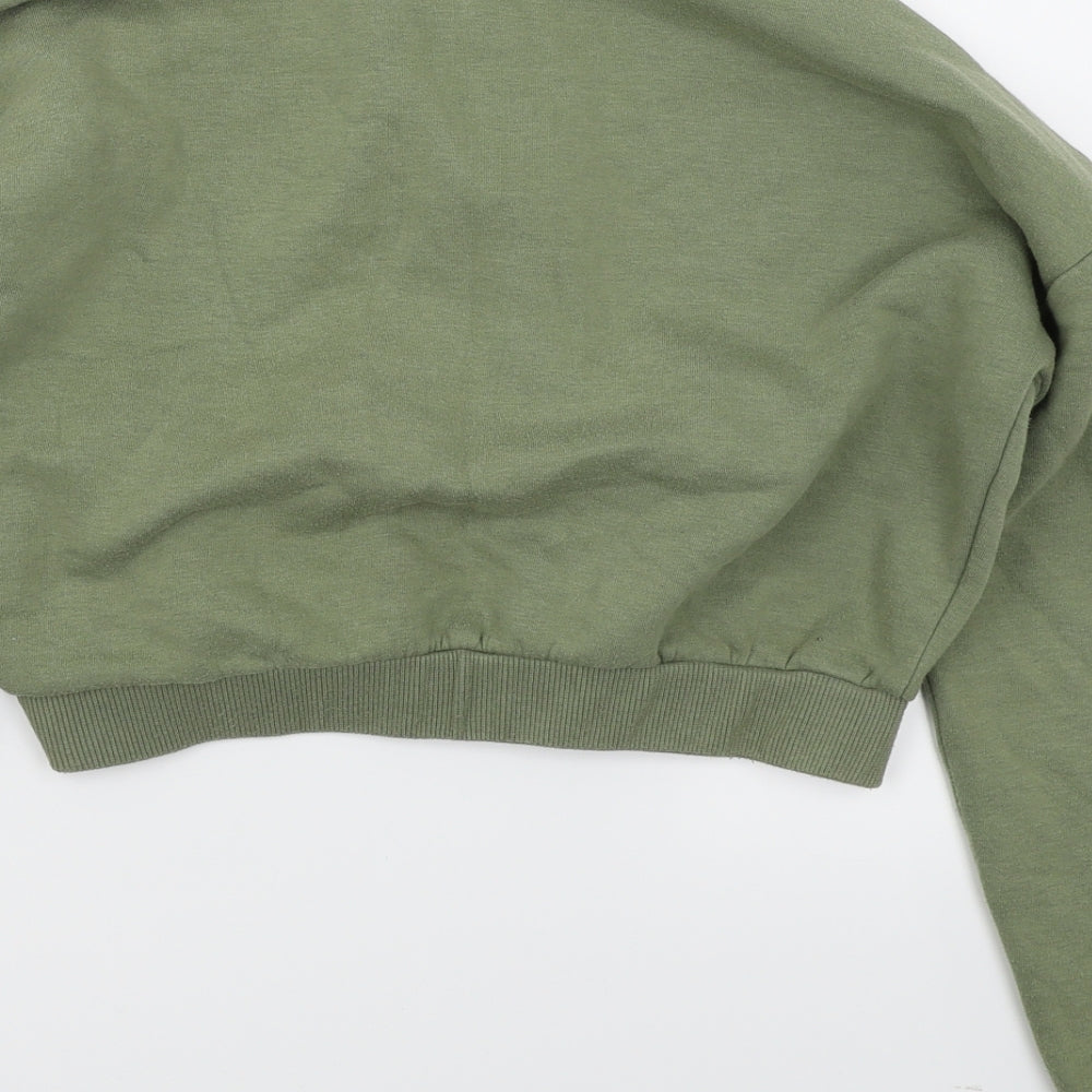 Brand and care label for 915 girls’ green pullover sweatshirt, size 12-13, years - cropped