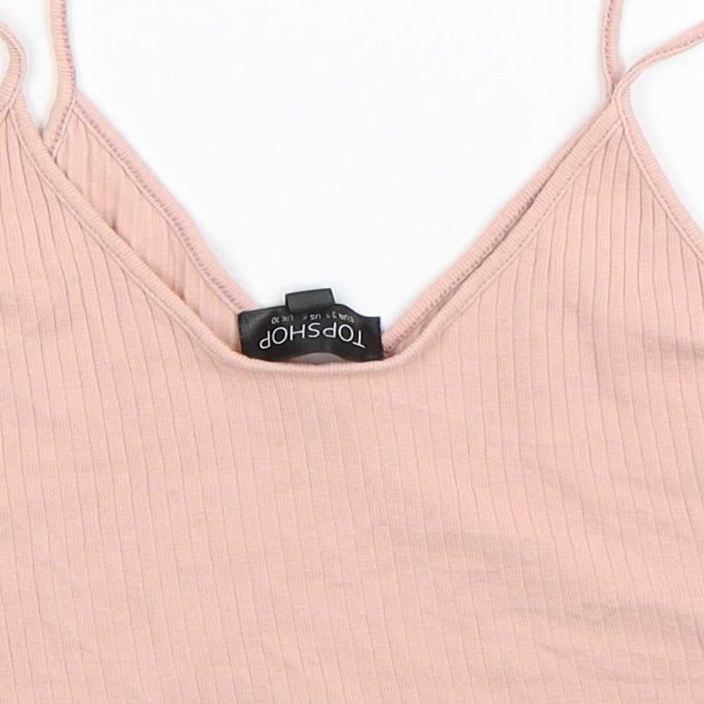 Brand and care label for Topshop women’s pink cropped tank, size UK 10