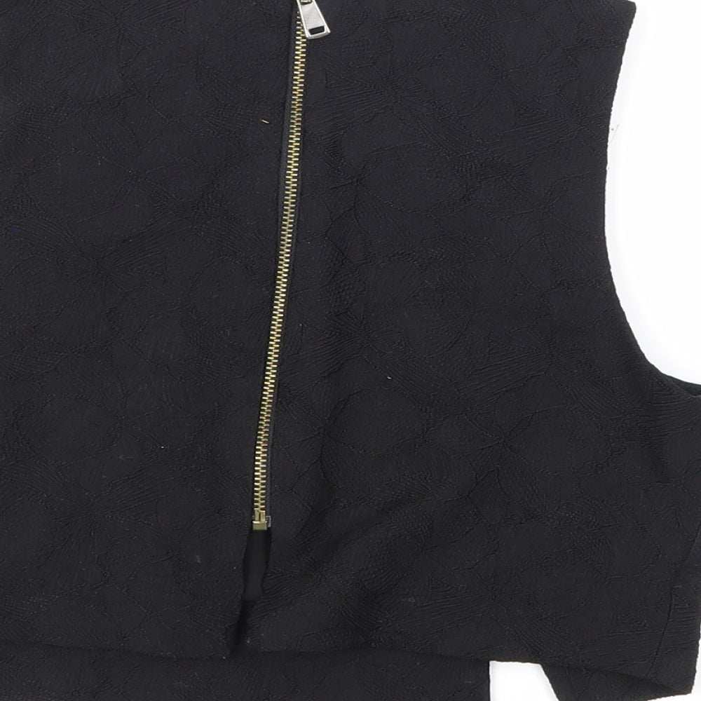 Brand and care label for River Island women’s black floral basic blouse, size UK 6