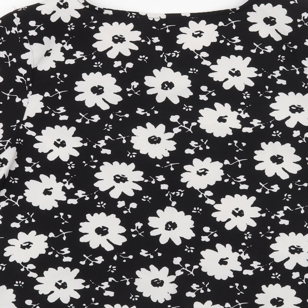 Brand and care label for Parisian Collection women’s black floral basic blouse, size UK 8