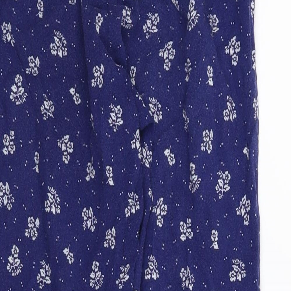 Brand and care label for H&M girls’ blue floral capri pyjama pants, size 9, years