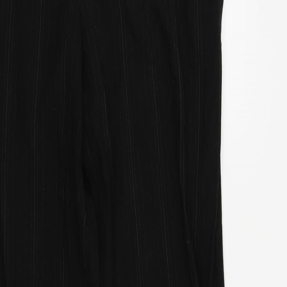 Brand and care label for Marks & Spencer women’s black striped dress pants trousers, size UK 14