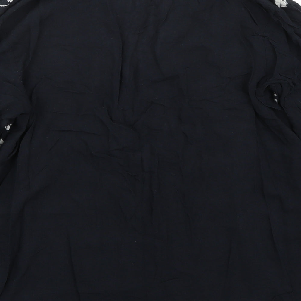 Brand and care label for Preworn women’s black basic t-shirt, size M