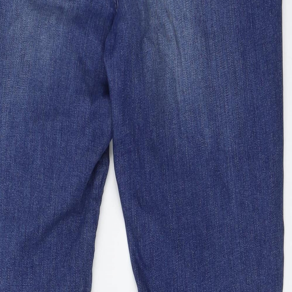 Brand and care label for F&F women’s blue skinny jeans, size UK 32, in, 27-inch leg