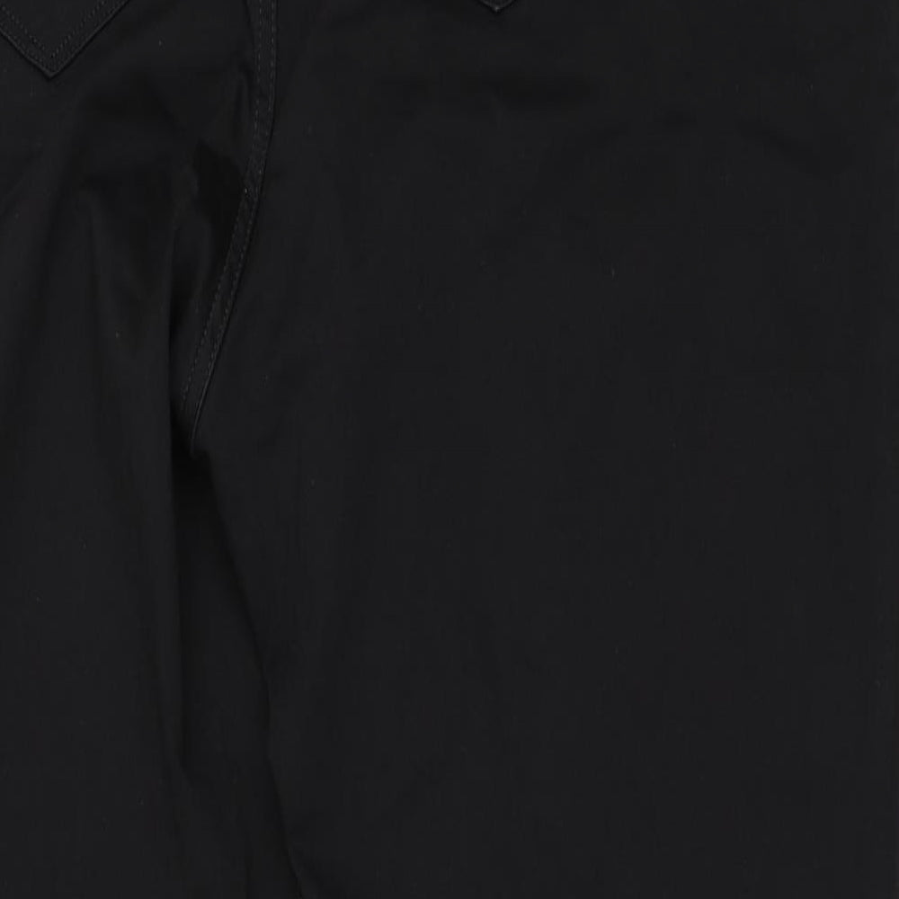 Brand and care label for H&M women’s black skinny jeans, size UK 28, 29-inch leg
