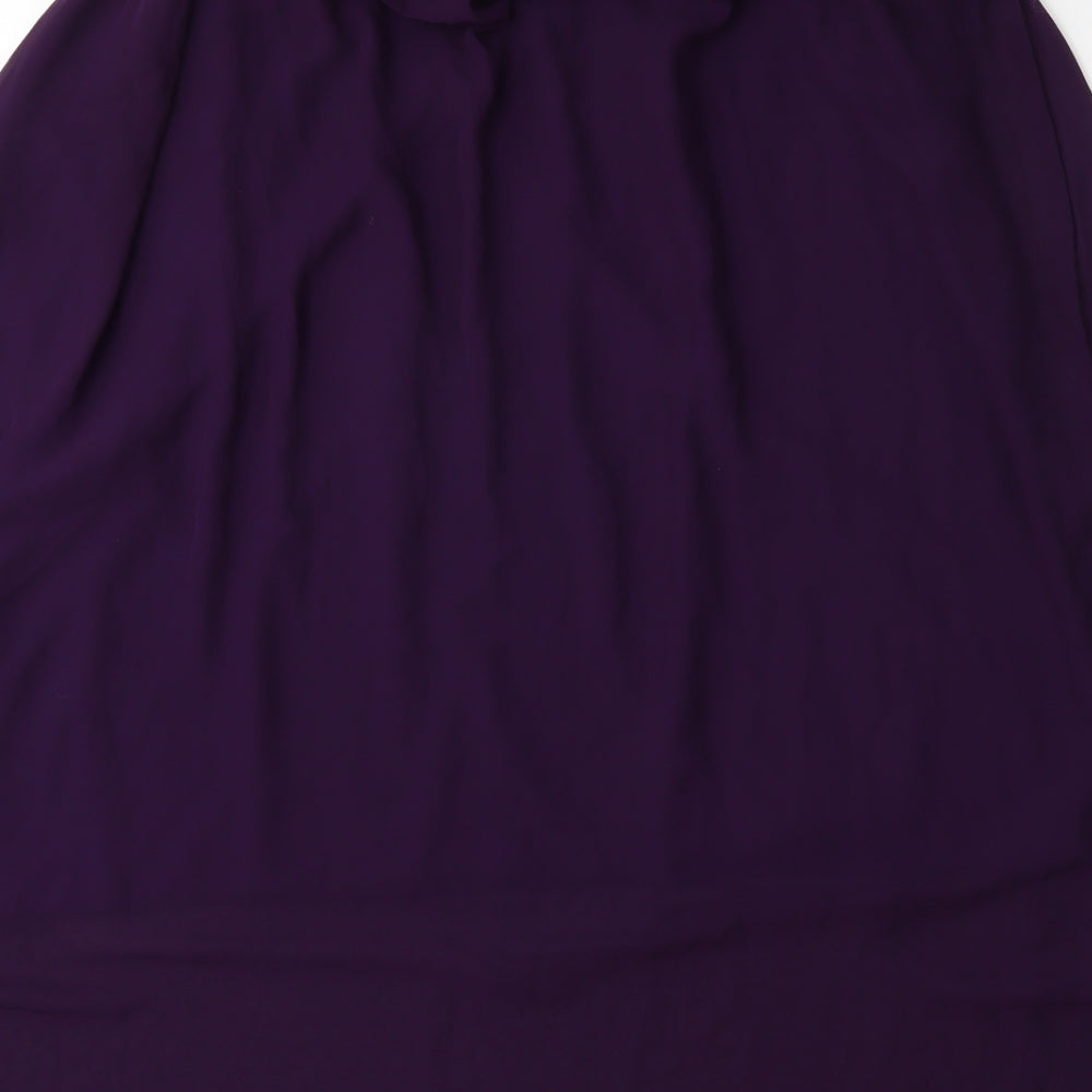 Brand and care label for Soda Mix women’s purple mini skirt, size UK 26, in
