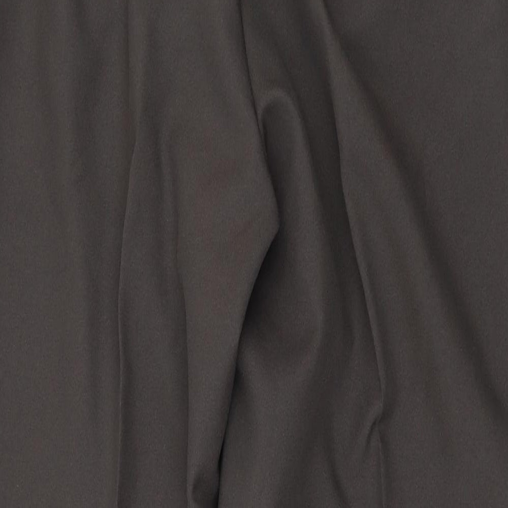 Brand and care label for PREMIER MAN men’s brown trousers, size 34, in