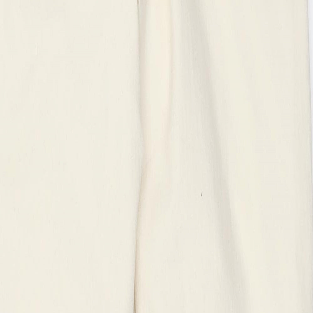 Brand and care label for women’s ivory denim skinny jeans, size UK 30, in, 32-inch leg