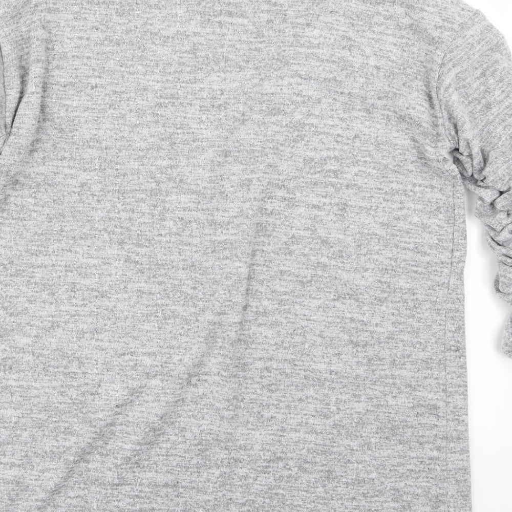 Brand and care label for Zara women’s grey jersey jumper, size S