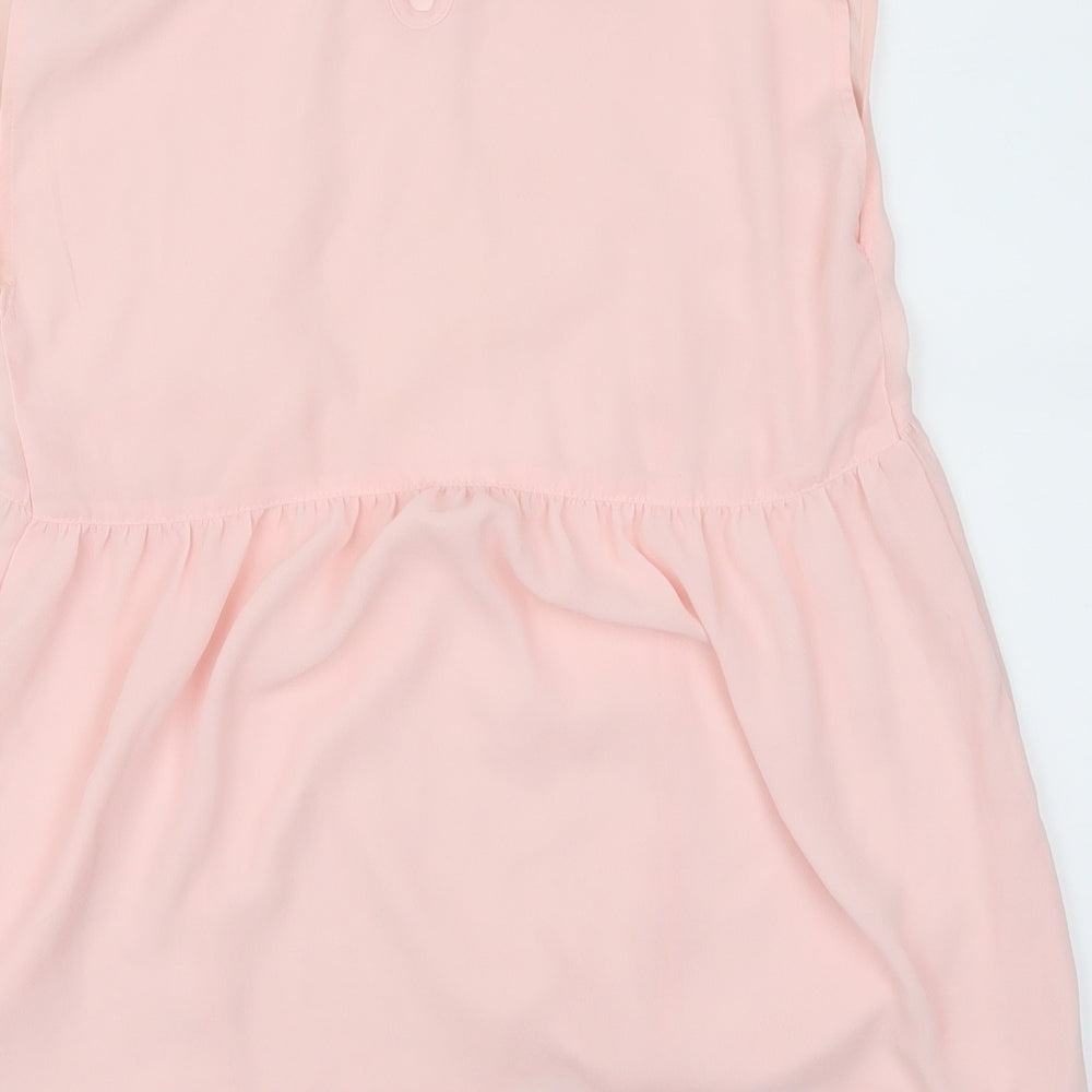 Brand and care label for Bershka women’s pink basic blouse, size M