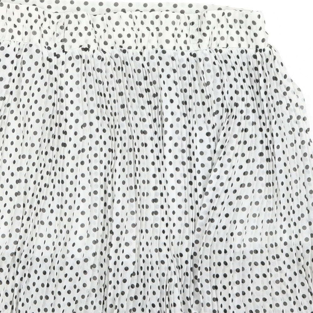 Brand and care label for Clillin women’s white polka dot a-line skirt, size S